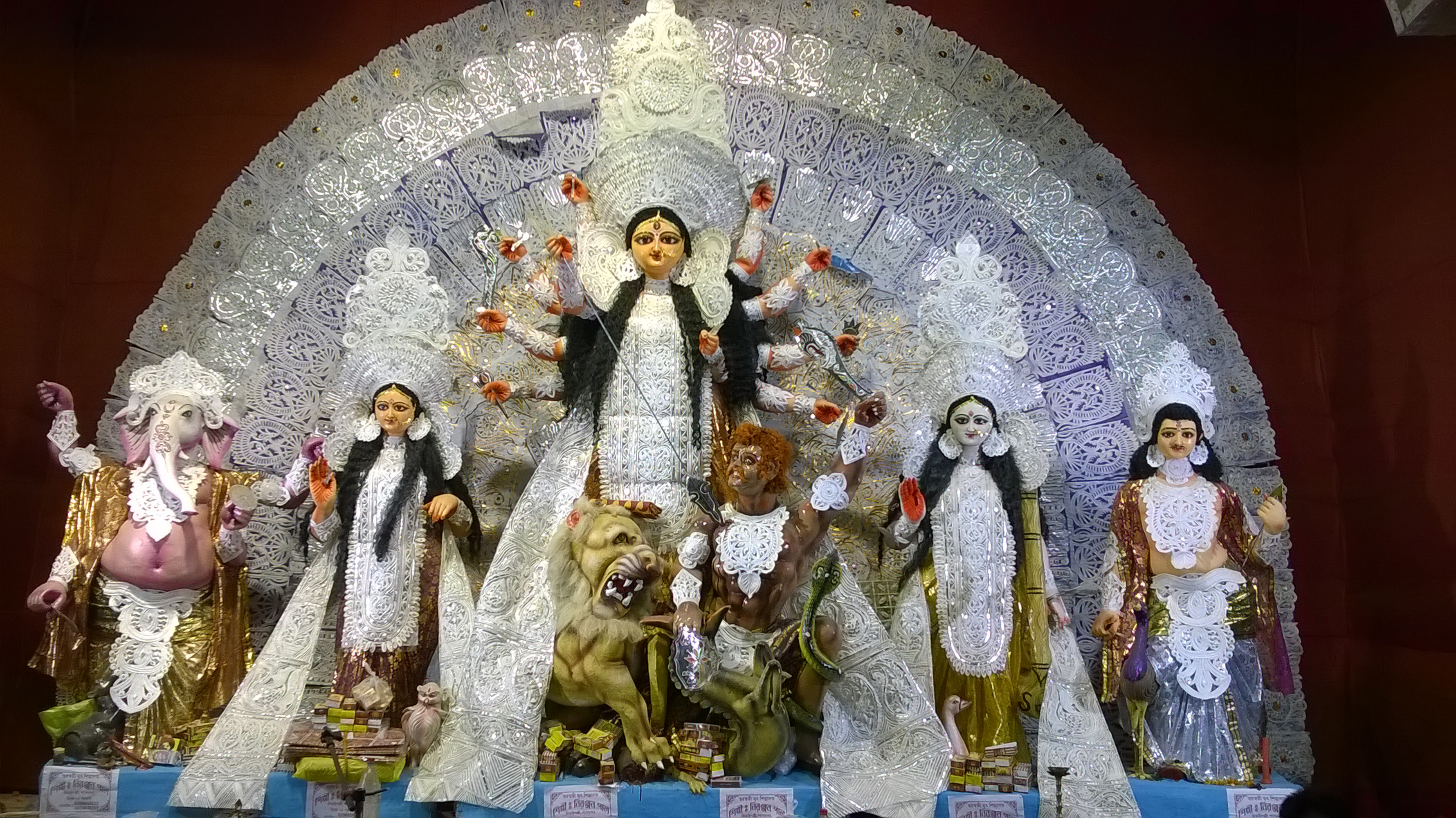 A richly illuminated Durga Puja celebration in Kolkata
